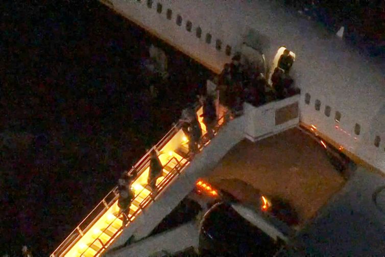 Venezuela's President Nicolas Maduro is led in custody from a U.S. federal airplane before his scheduled court appearance at Manhattan federal court, at Stewart Air National Guard Base in Newburgh, New York, U.S. January 3, 2026.  ABC Affiliate WABC via REUTERS 
NO RESALES. NO ARCHIVES. THIS IMAGE HAS BEEN SUPPLIED BY A THIRD PARTY. MANDATORY CREDIT