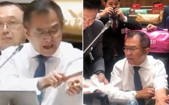 Deputado corta o próprio pulso em debate parlamentar na Tailândia